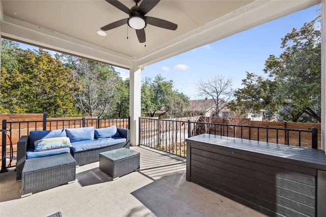 view of patio with ceiling fan and outdoor lounge area