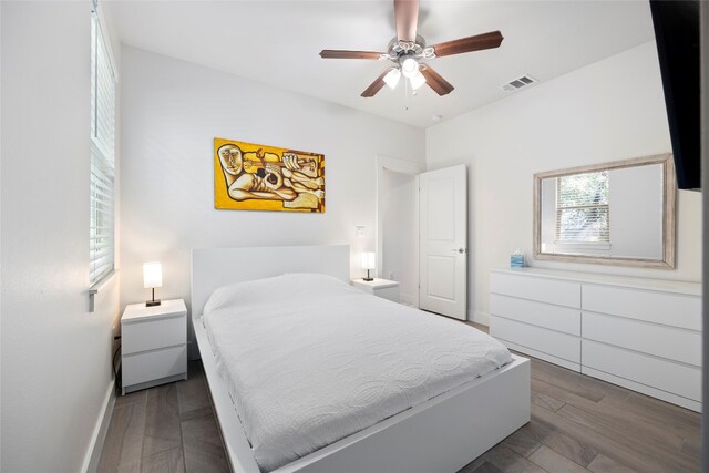 bedroom featuring ceiling fan and wood-type flooring