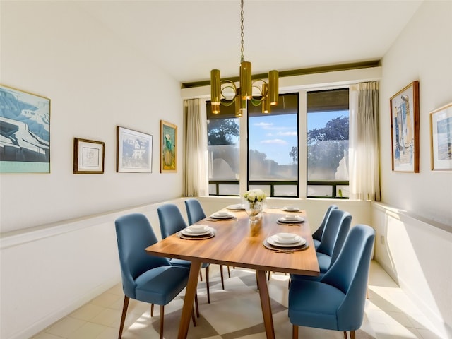 dining room featuring a chandelier