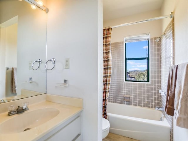 full bathroom with shower / tub combo, vanity, and toilet