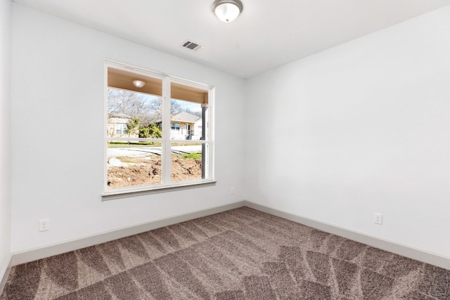 unfurnished room featuring carpet floors