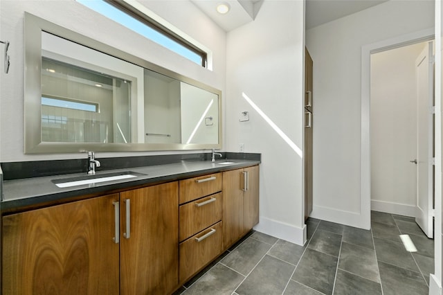 bathroom featuring double sink vanity and tile patterned floors