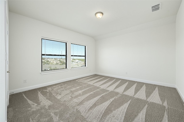 unfurnished room with carpet flooring