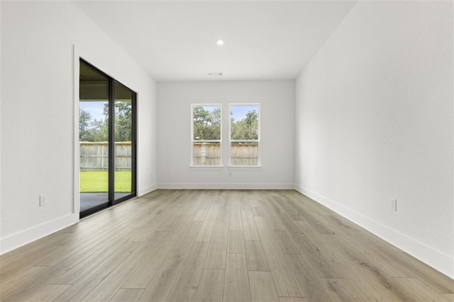 empty room with light wood-type flooring