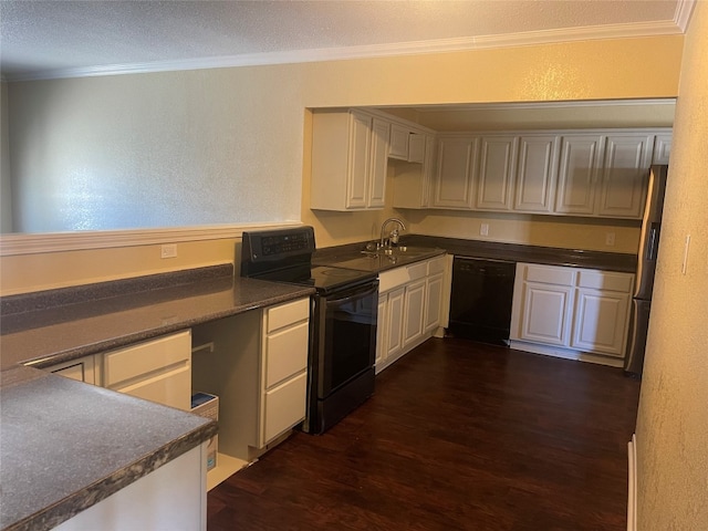 kitchen featuring sink, ornamental molding, dark wood-type flooring, black appliances, and white cabinetry