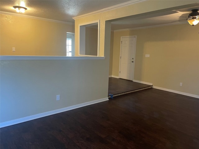 spare room with crown molding, ceiling fan, a textured ceiling, and dark hardwood / wood-style flooring