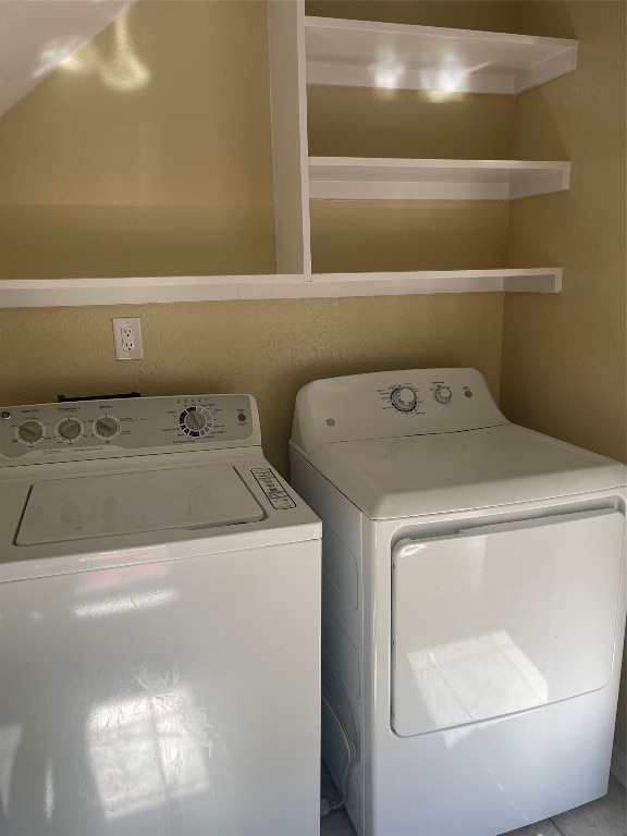 laundry area featuring washing machine and dryer