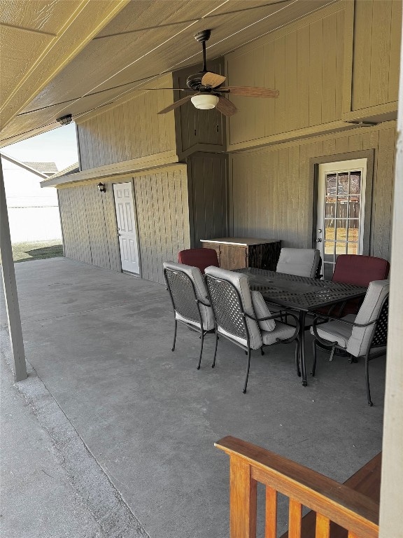 view of terrace with an outdoor hangout area and ceiling fan