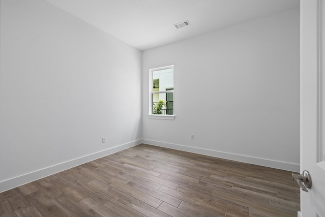 empty room featuring hardwood / wood-style floors