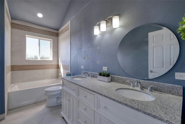 bathroom with toilet, vaulted ceiling, dual vanity, and tile flooring