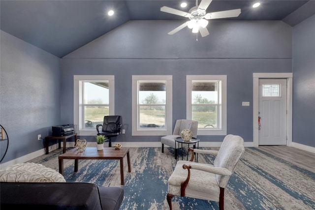 living room featuring high vaulted ceiling, ceiling fan, and hardwood / wood-style flooring