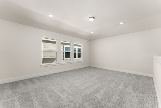 unfurnished room with recessed lighting, carpet, and baseboards