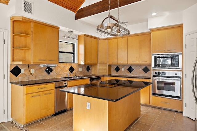 kitchen with beam ceiling, decorative backsplash, black appliances, and a center island