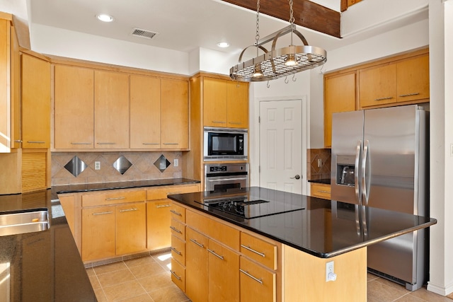 kitchen with backsplash, light tile patterned floors, black appliances, and a kitchen island