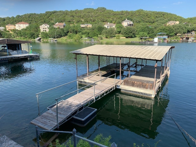 view of dock featuring a water view