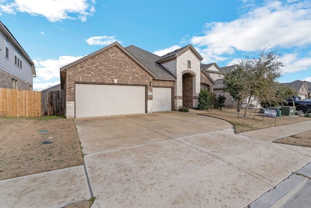 view of front of property with a garage