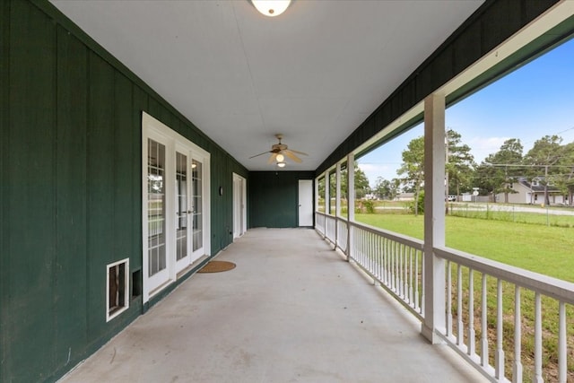 view of patio featuring ceiling fan and a porch