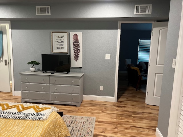 bedroom featuring light hardwood / wood-style flooring