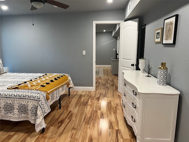 bedroom featuring ceiling fan and light wood-type flooring