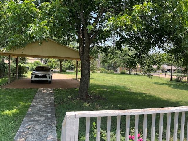 view of yard featuring a carport