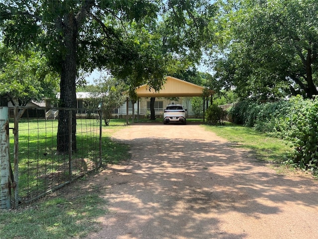 view of front of home with a carport