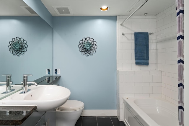 full bathroom featuring toilet, shower / bathtub combination with curtain, tile patterned floors, and vanity