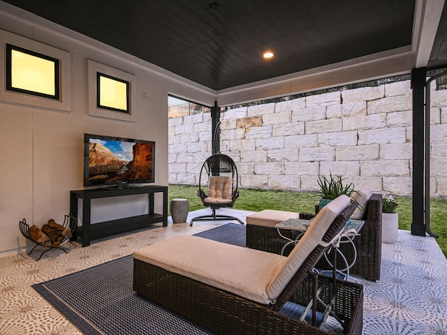 view of patio / terrace with exterior fireplace