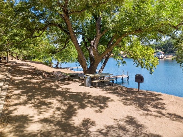 property view of water with a boat dock