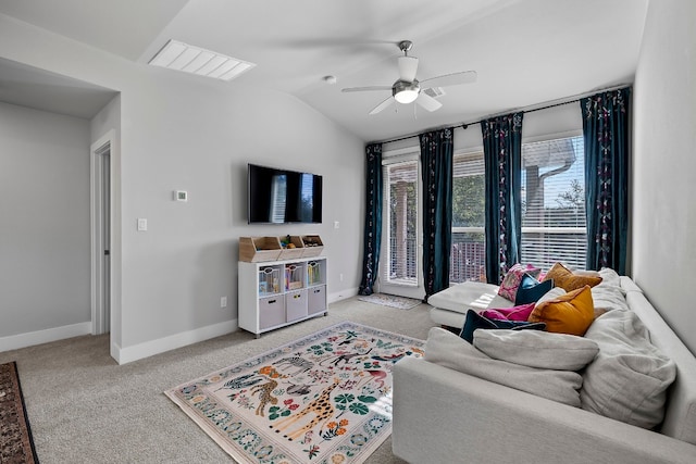 living room with light carpet, lofted ceiling, and ceiling fan