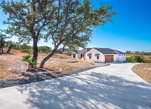 view of front of home featuring a garage