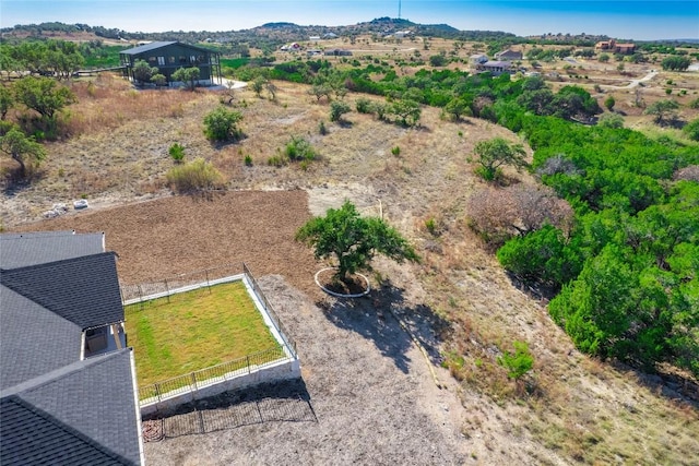 drone / aerial view featuring a mountain view