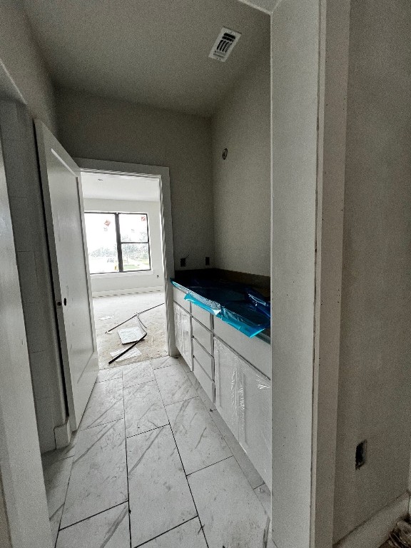 bathroom featuring tile flooring