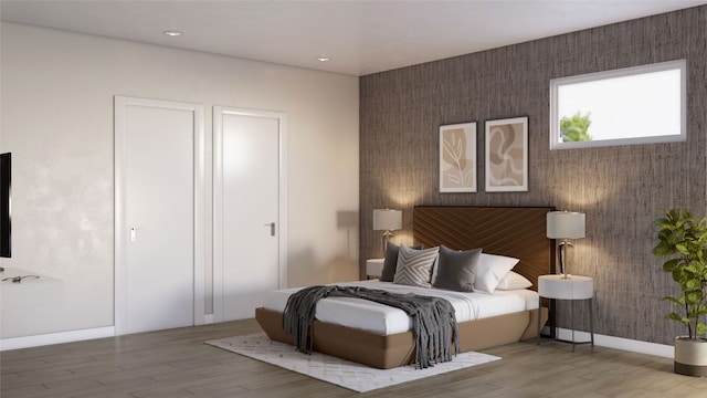 bedroom featuring hardwood / wood-style flooring