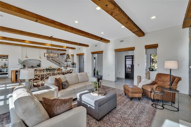 130 Overlook Dr, Fredericksburg, TX 78624 - living area with an inviting chandelier, beam ceiling, visible vents, and recessed lighting