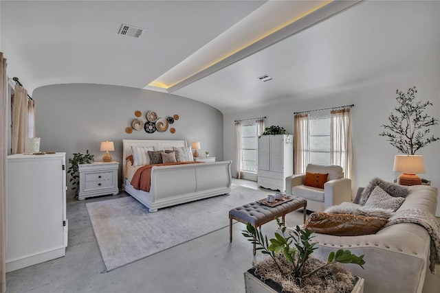 130 Overlook Dr, Fredericksburg, TX 78624 - bedroom with lofted ceiling, visible vents, and finished concrete flooring