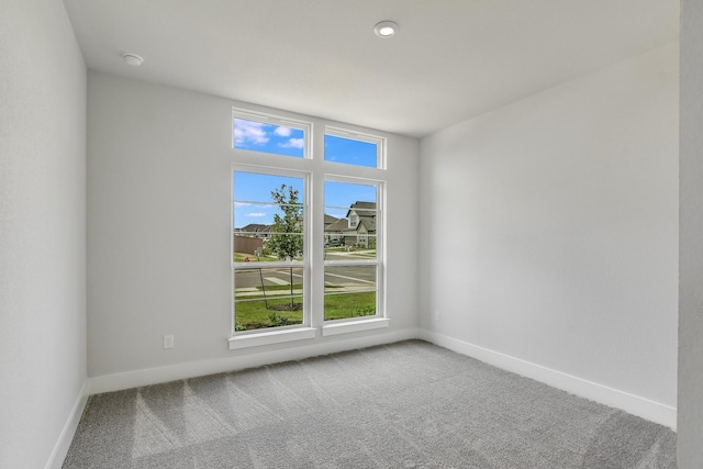 empty room featuring carpet floors