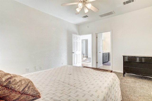 bedroom featuring ceiling fan and light carpet