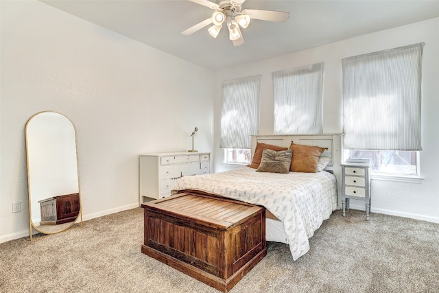 bedroom featuring ceiling fan and light colored carpet