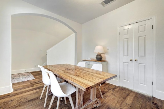 dining room featuring dark wood-type flooring