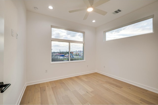 unfurnished room with light hardwood / wood-style floors and ceiling fan