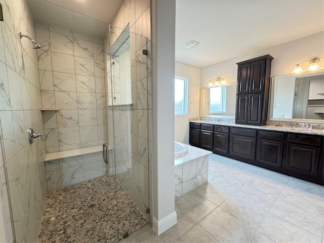 bathroom featuring plus walk in shower and vanity