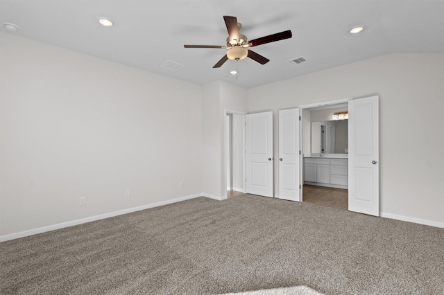 unfurnished bedroom featuring carpet and ceiling fan