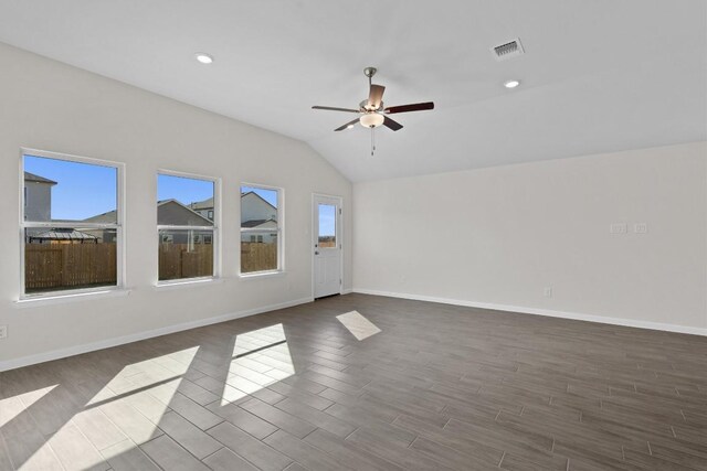 spare room featuring ceiling fan and lofted ceiling