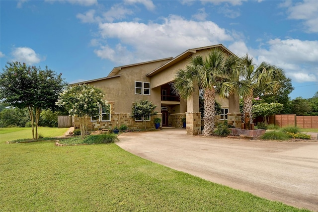 view of front of home with a front lawn