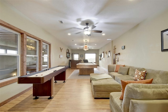 rec room with light hardwood / wood-style flooring, billiards, and ceiling fan