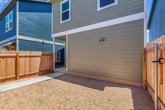 rear view of house featuring a patio