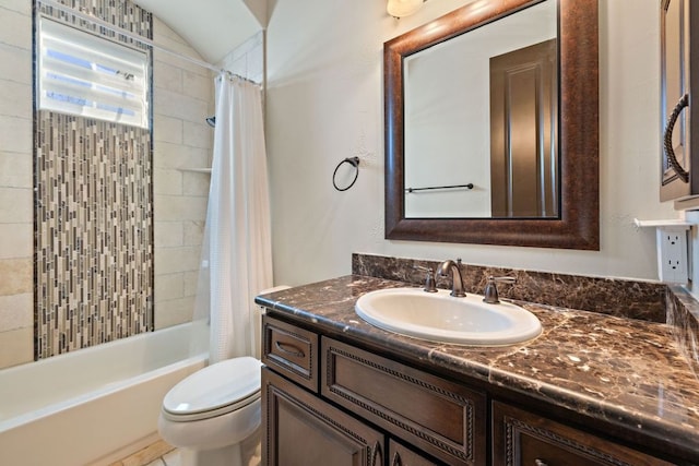 bathroom featuring shower / bath combo, vanity, and toilet