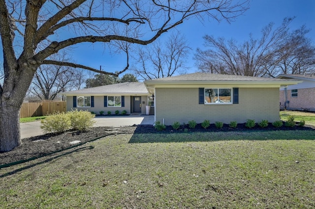 ranch-style house with a front yard