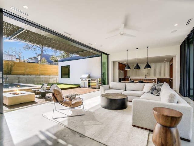 living room featuring ceiling fan