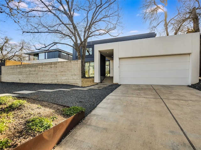 contemporary home with a garage